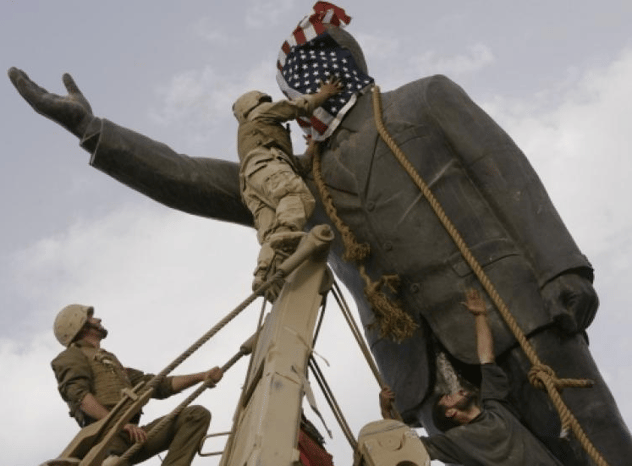 Saddam Hussain Statue.png